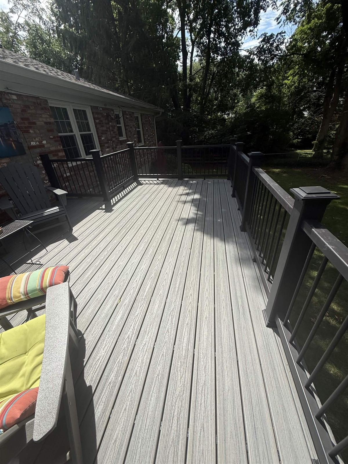 Gray composite deck with dark bronze railing built by Big Blue Fence & Deck in Lexington KY